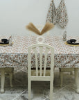 Handcrafted White Cotton Table Cover with Mandakani Leaf Floral Block Patterns in Gray and Brown By Fabdivine